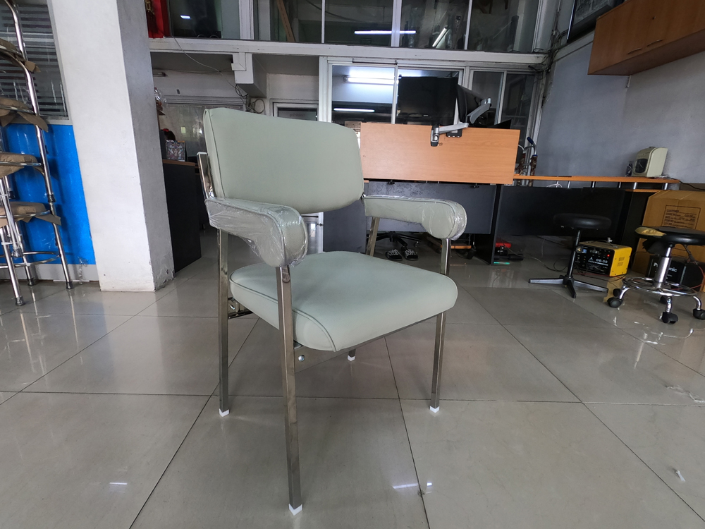 79061::C-101::A NAT row chair with armrest, PVC leather seat and chrome plated base. Dimension (WxDxH) cm : 53.5x61x80
